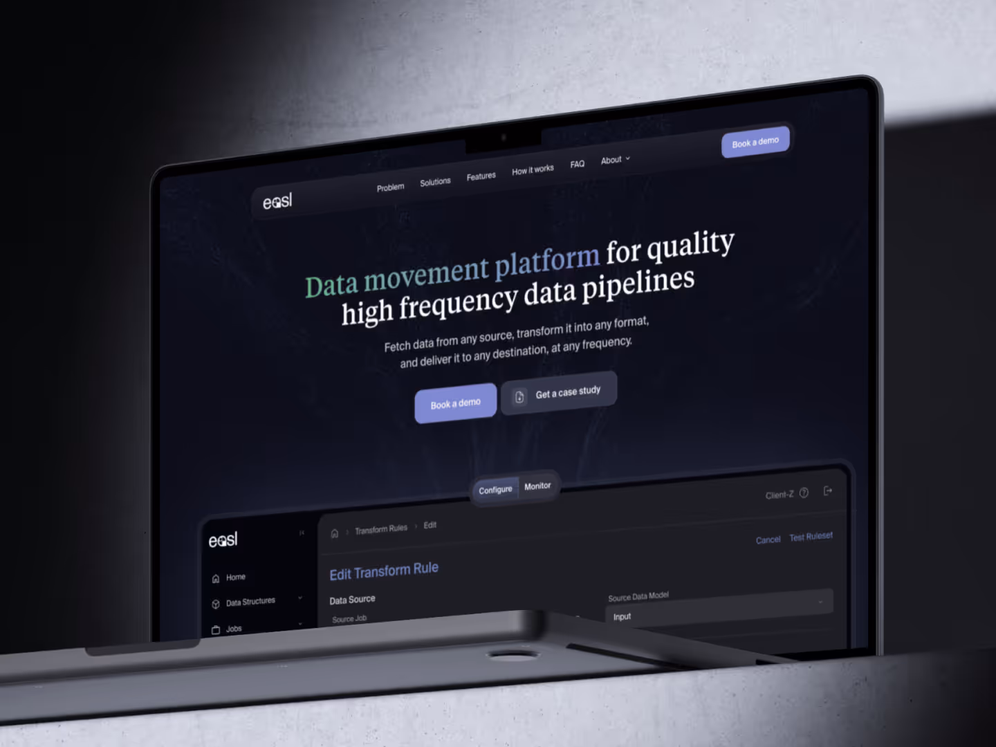 EASL TECH website on a laptop, a dark software startup design with an interactive particle background made in Spline